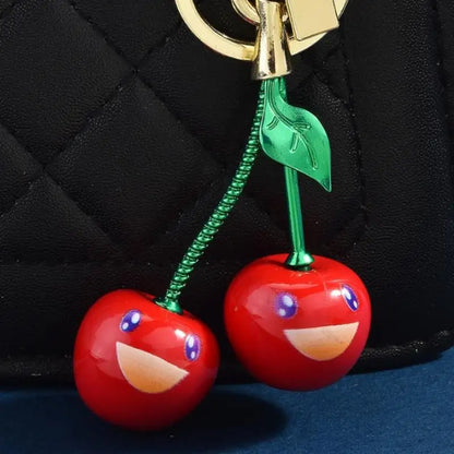Fashionable smiling cherry keychain