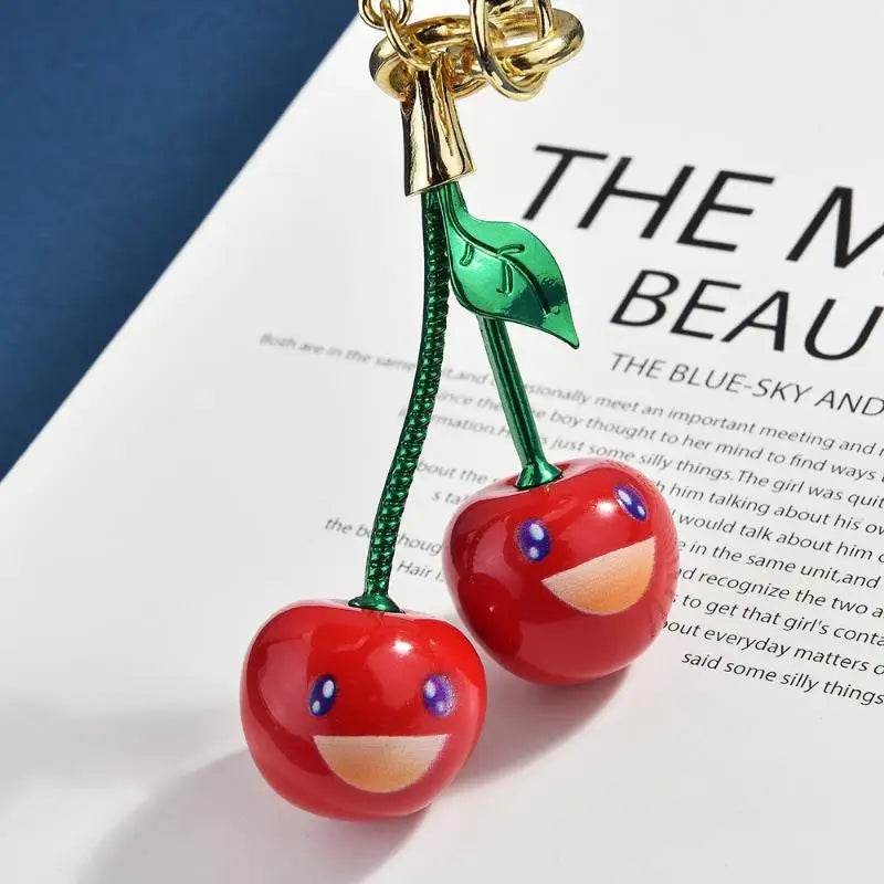 Fashionable smiling cherry keychain